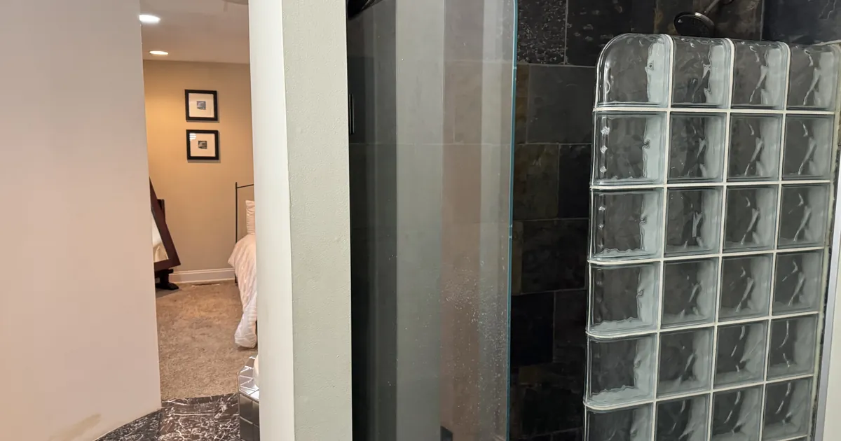 how to remove hard water stains St. Louis professional mineral deposit treatment shower glass faucet