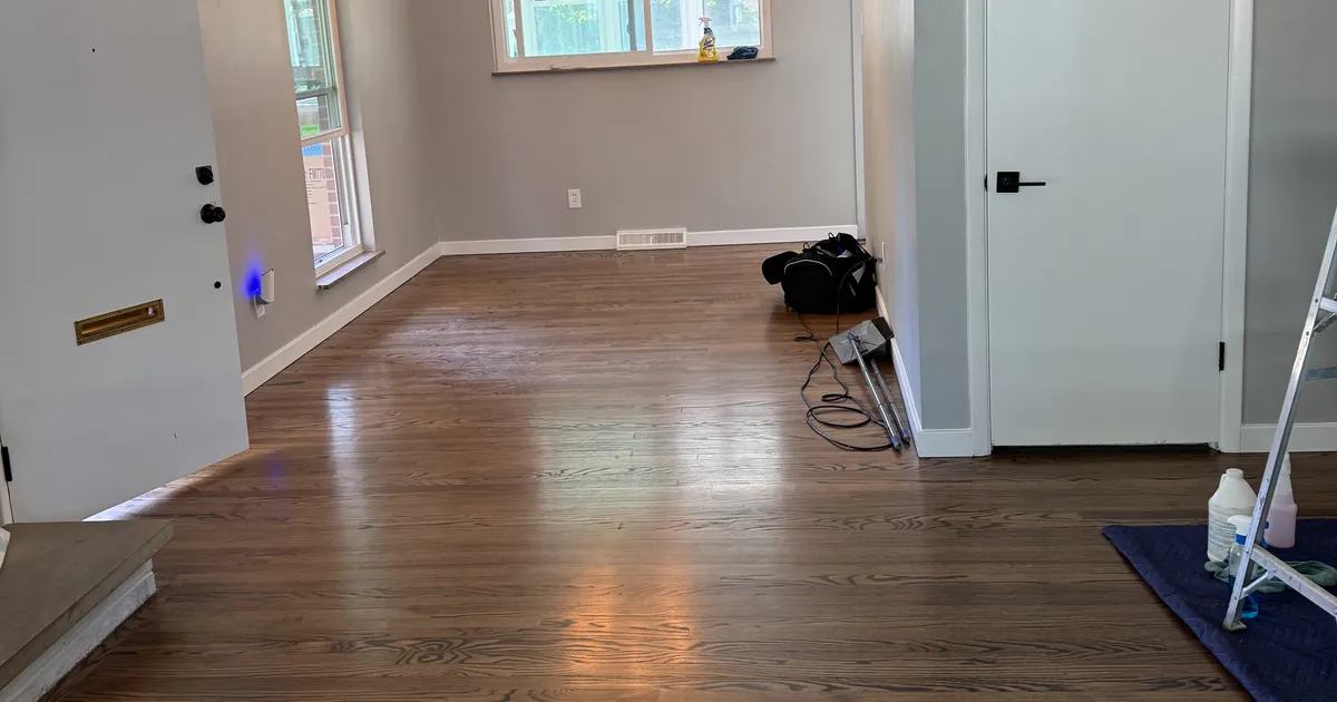 Clean hardwood floors and fresh walls in an empty St. Louis home after a detailed clean
